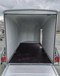 Remorque cargo Pullman Debon 1300 bleue avec suspension et porte latérale